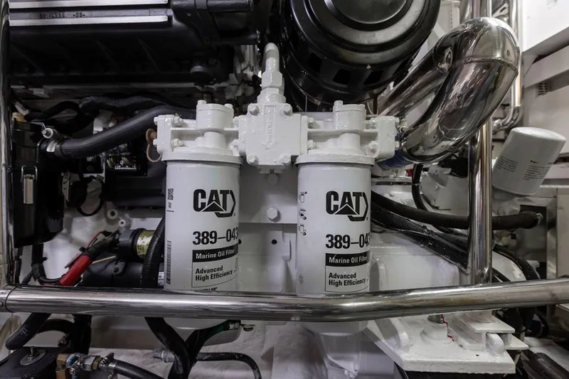 3w Yacht Photos Pics Engine room of 2010 Horizon 74 Motoryacht with CAT marine oil filters.