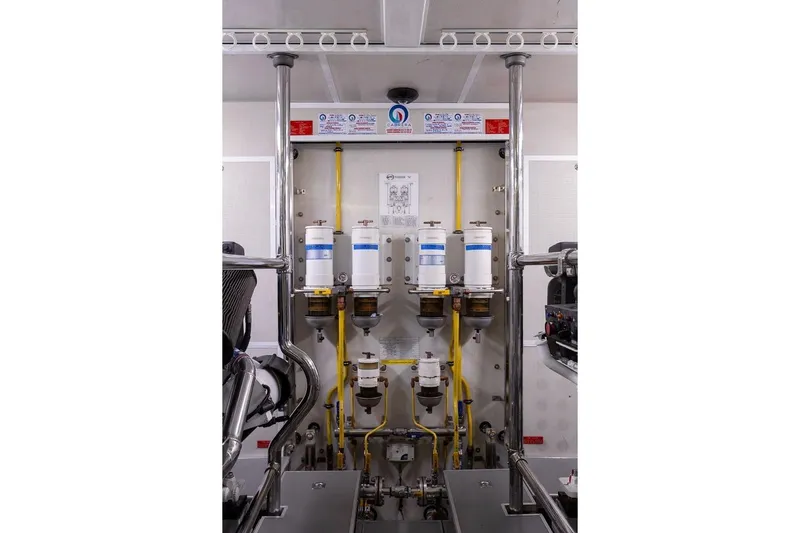 3w Yacht Photos Pics Engine room of 2010 Horizon 74 Motoryacht with fuel filters and piping system.