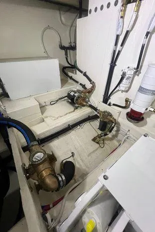 Yacht Photos Pics Engine room of 2020 Tiara Yachts 53 Coupe with visible mechanical components.