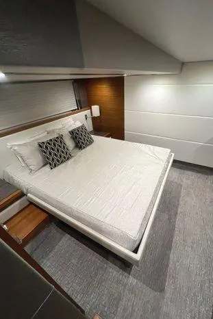  Yacht Photos Pics Luxurious bedroom interior of 2020 Tiara Yachts 53 Coupe with modern design.