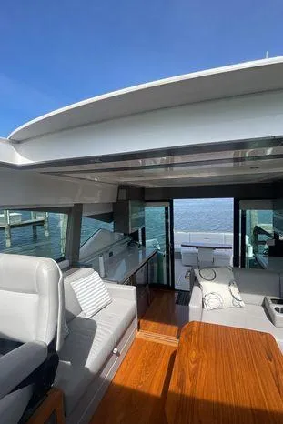  Yacht Photos Pics 2020 Tiara Yachts 53 Coupe interior with sleek design and ocean view.