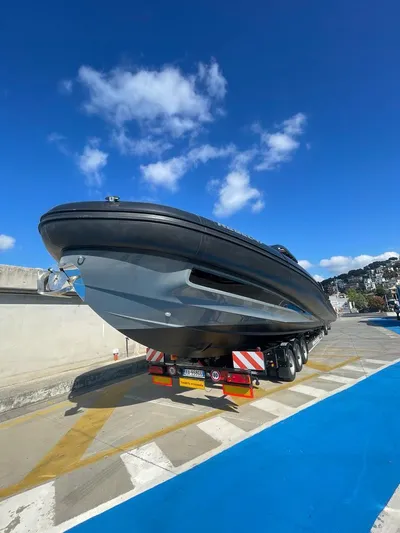  Yacht Photos Pics 2018 SACS Rebel 47 boat on trailer under clear blue sky.