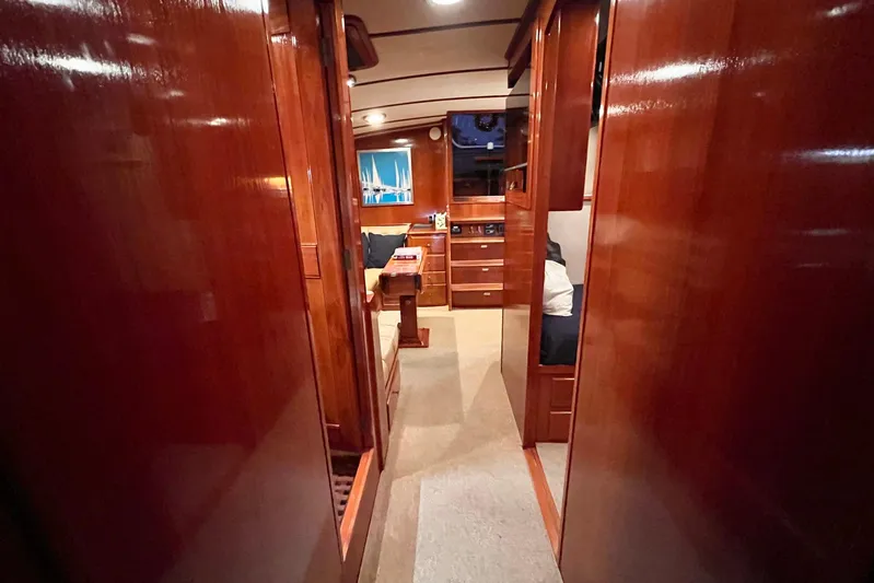 Last Dance Yacht Photos Pics Luxurious wooden interior of 2001 Grand Banks 49 Eastbay HX yacht cabin.