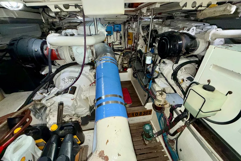 Last Dance Yacht Photos Pics Engine room of 2001 Grand Banks 49 Eastbay HX with visible machinery and components.