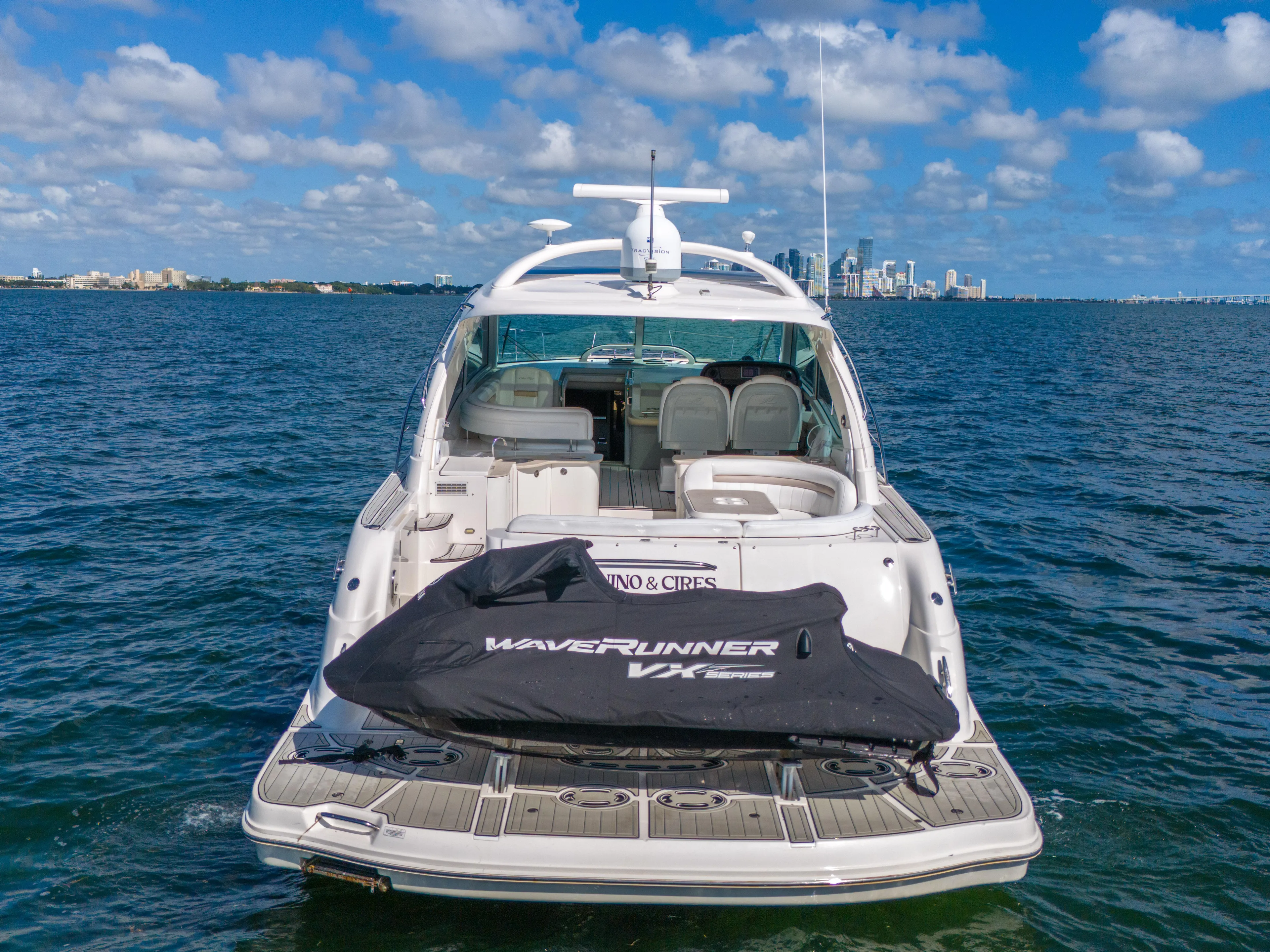  Yacht Photos Pics 2010 Sea Ray 500 Sundancer yacht with WaveRunner, docked on a sunny day.