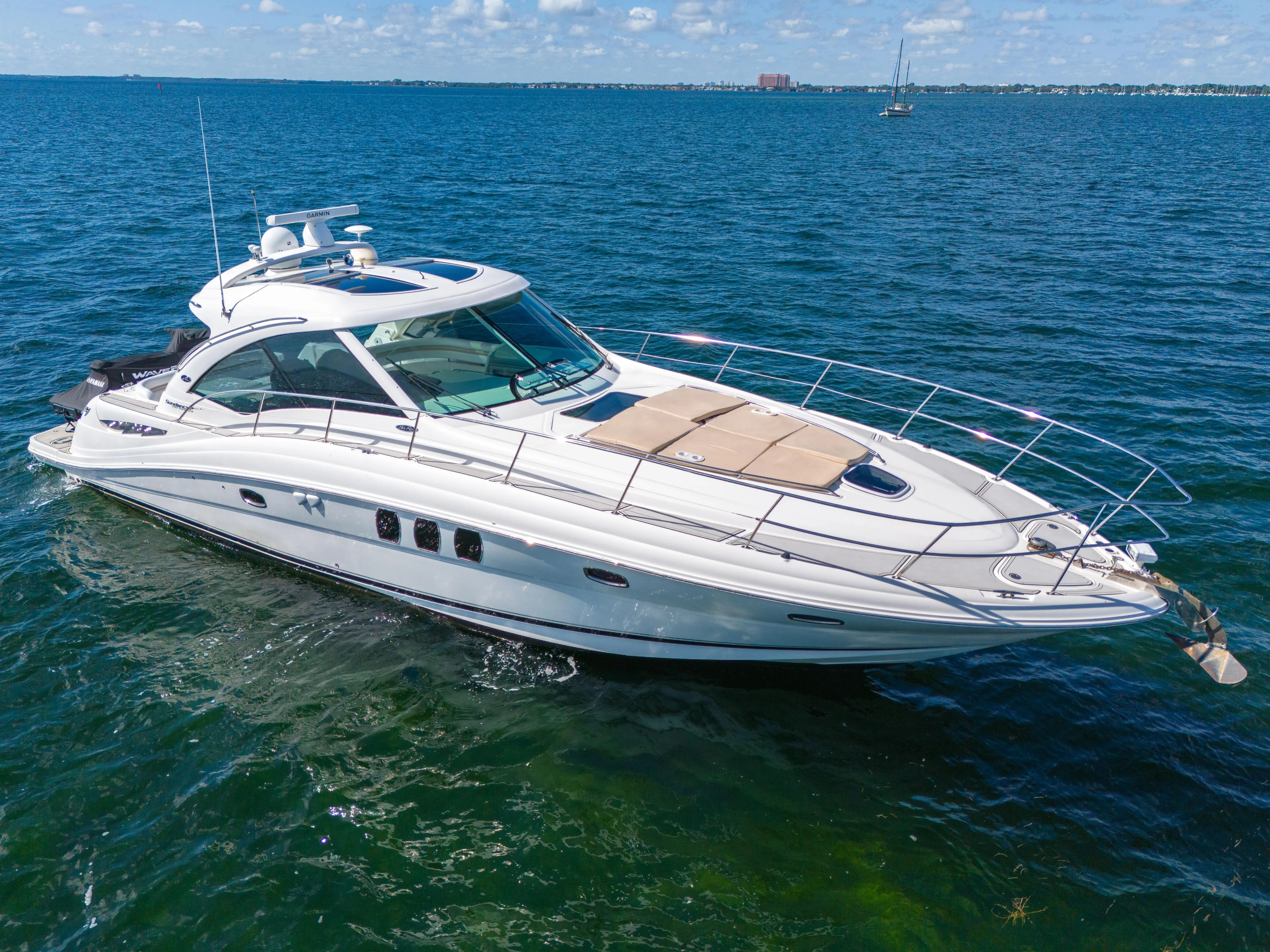  Yacht Photos Pics 2010 Sea Ray 500 Sundancer yacht cruising on open water.