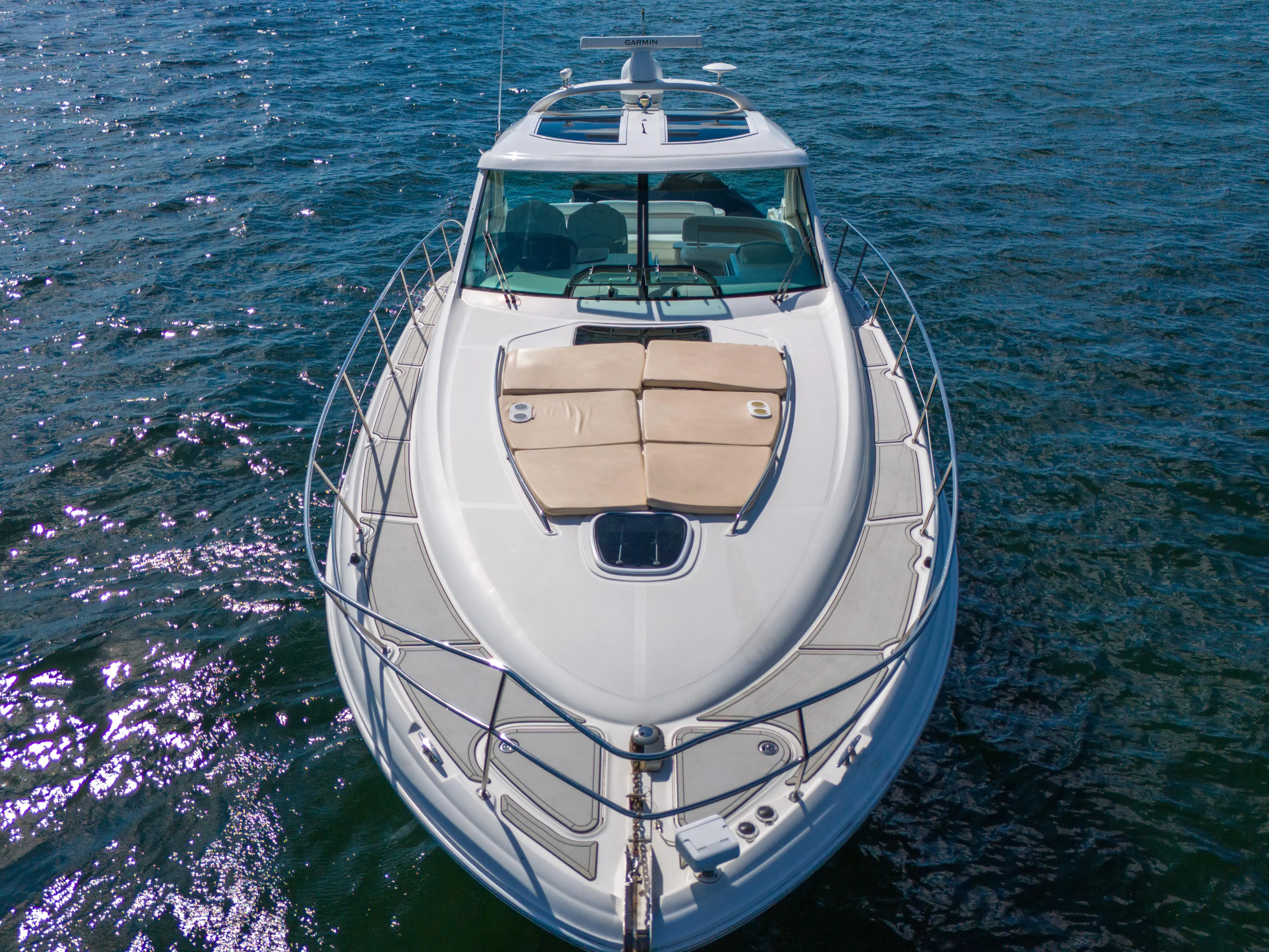  Yacht Photos Pics 2010 Sea Ray 500 Sundancer yacht on open water, aerial view.