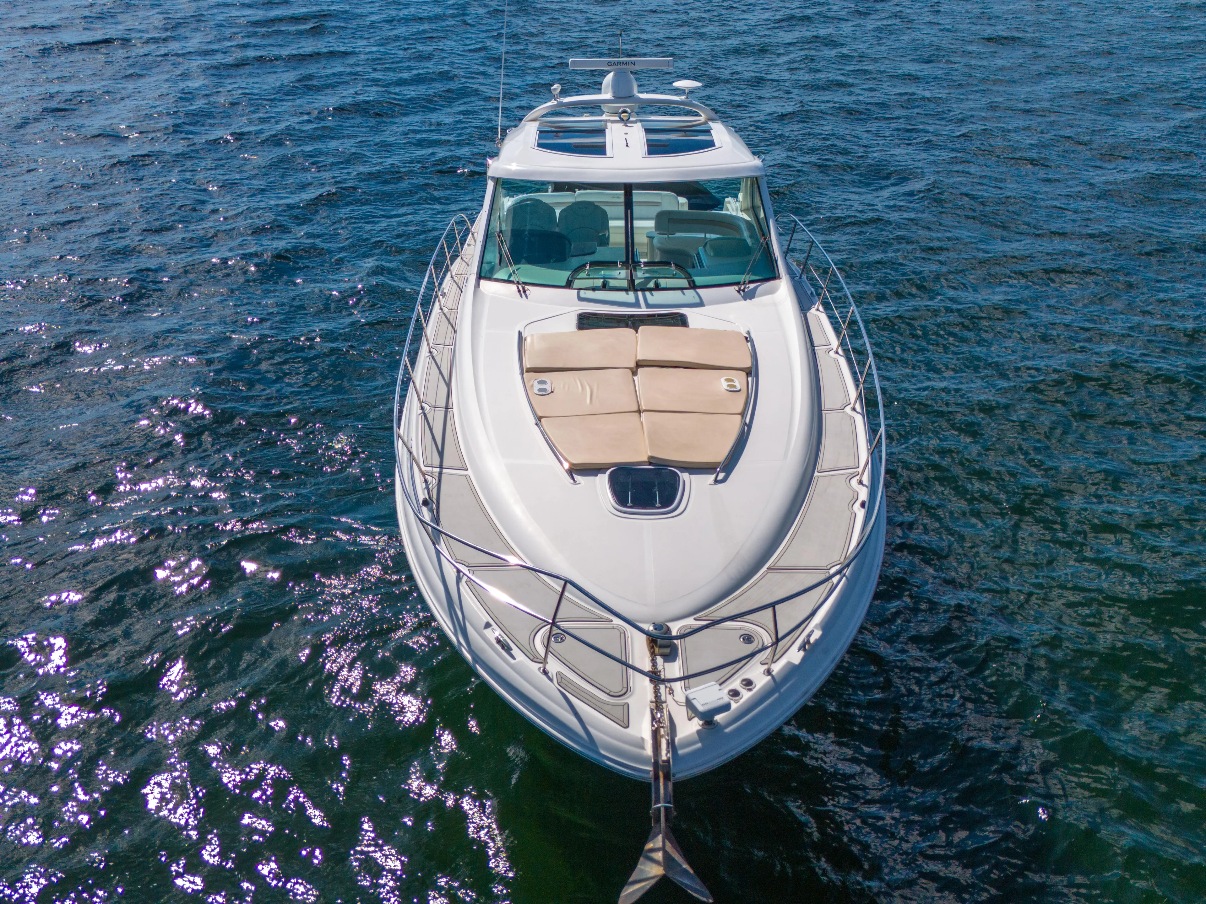  Yacht Photos Pics 2010 Sea Ray 500 Sundancer yacht on open water, aerial view.