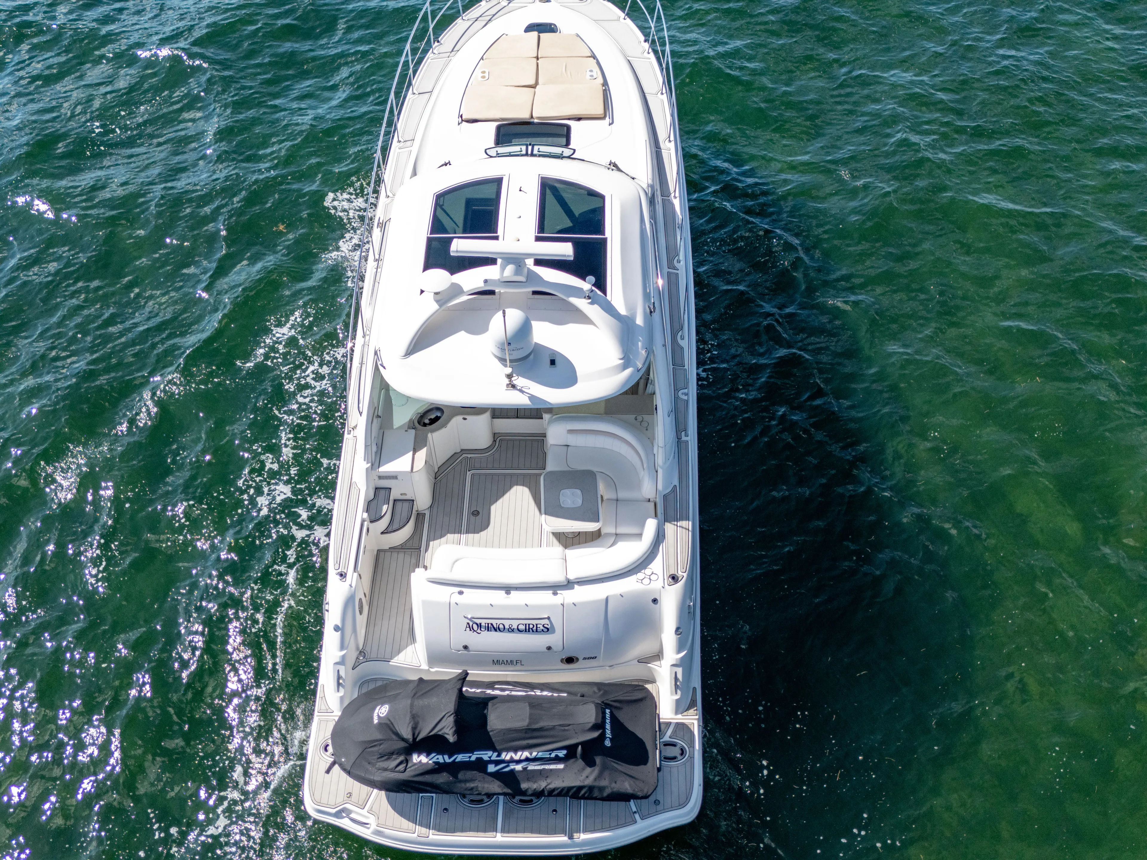  Yacht Photos Pics Aerial view of 2010 Sea Ray 500 Sundancer yacht on open water.