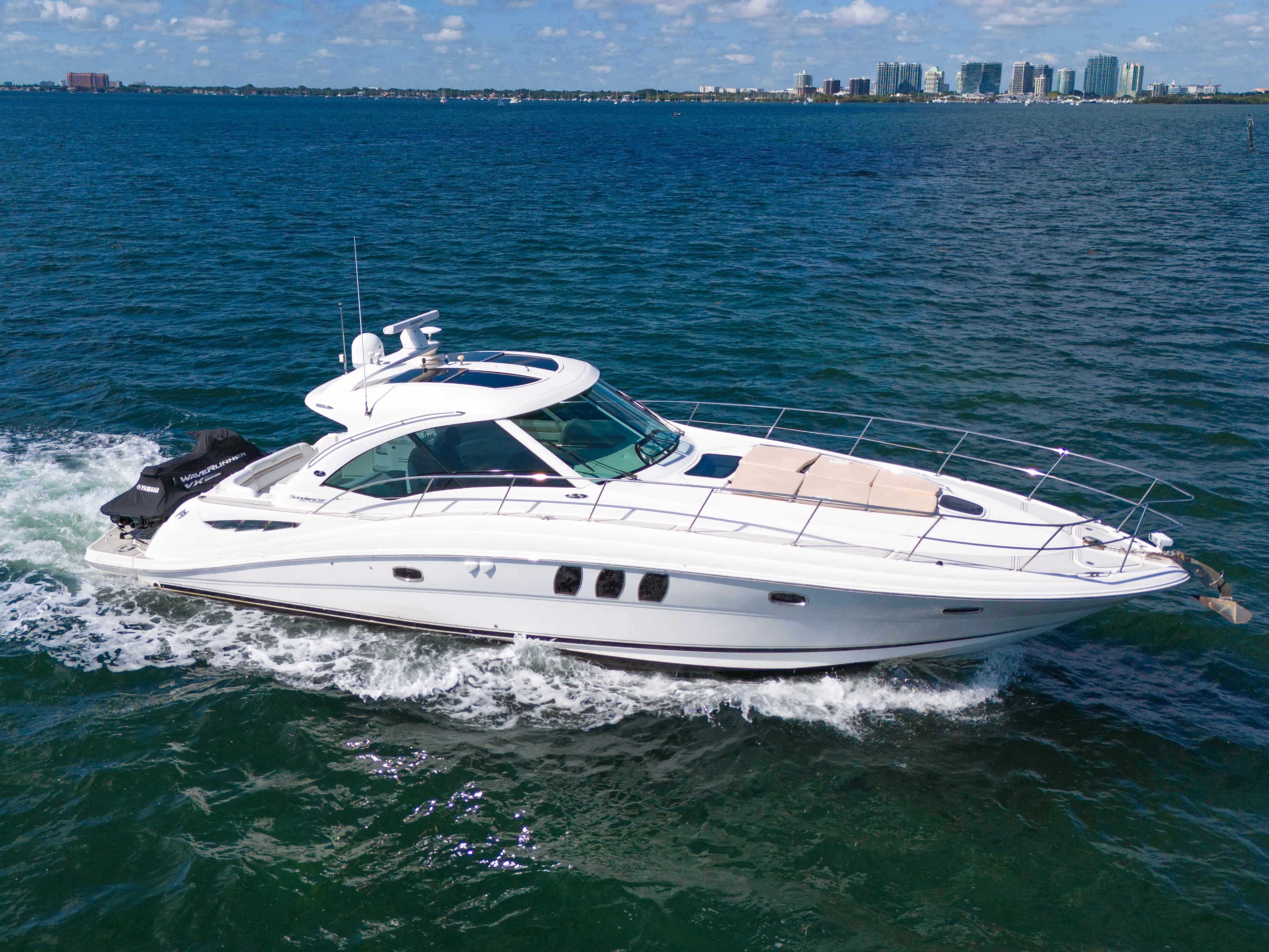  Yacht Photos Pics 2010 Sea Ray 500 Sundancer yacht cruising on open water.