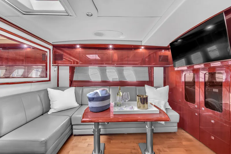  Yacht Photos Pics Luxurious interior of 2010 Sea Ray 500 Sundancer yacht with elegant seating and modern amenities.