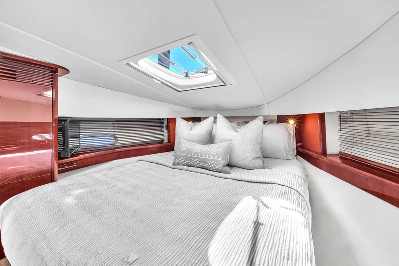  Yacht Photos Pics Luxurious cabin interior of 2010 Sea Ray 500 Sundancer yacht with skylight.