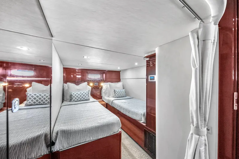  Yacht Photos Pics Interior cabin of 2010 Sea Ray 500 Sundancer yacht with twin beds and modern decor.