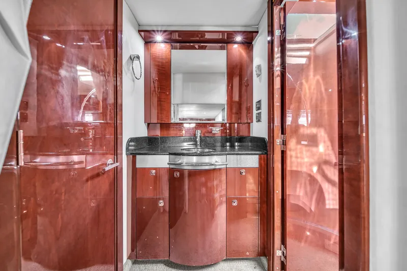  Yacht Photos Pics Luxurious interior of 2010 Sea Ray 500 Sundancer yacht with polished wood finish.