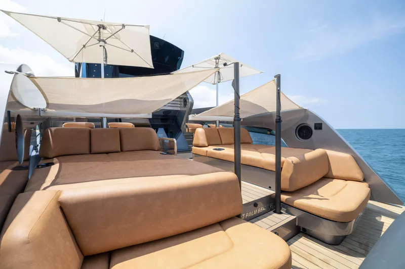 Grit Yacht Photos Pics Luxurious 2025 Steeler Bronson 67 Beachclub yacht with elegant sunbathing area and ocean view.