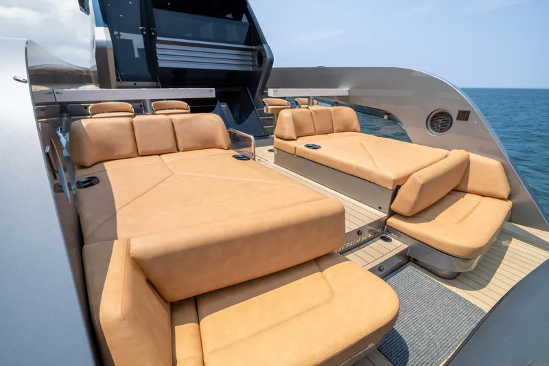 Grit Yacht Photos Pics Luxurious 2025 Steeler Bronson 67 Beachclub yacht with spacious sun loungers on deck.