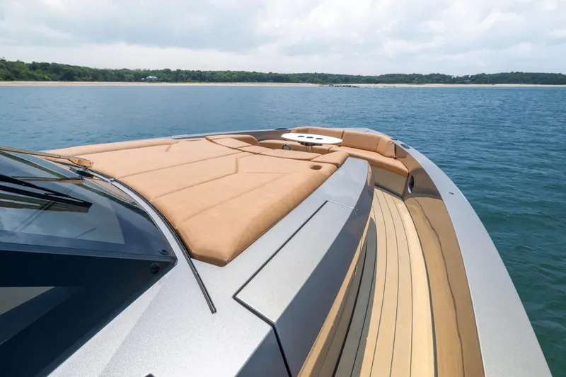 Grit Yacht Photos Pics 2025 Steeler Bronson 67 Beachclub yacht with luxurious deck and seating on open water.