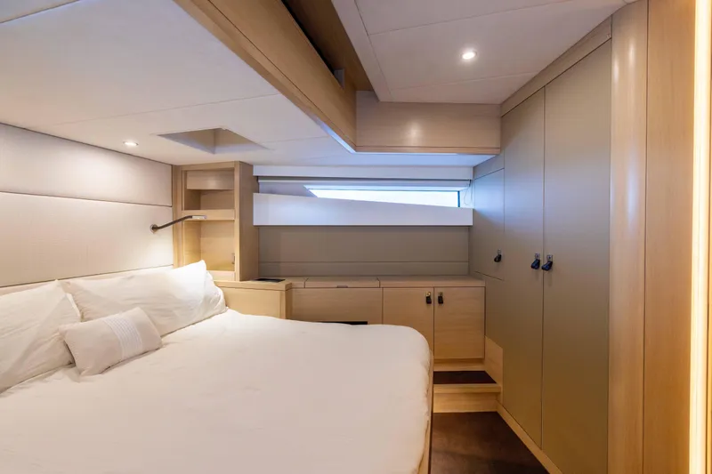 Grit Yacht Photos Pics Luxurious cabin interior of 2025 Steeler Bronson 67 Beachclub yacht, featuring modern design.
