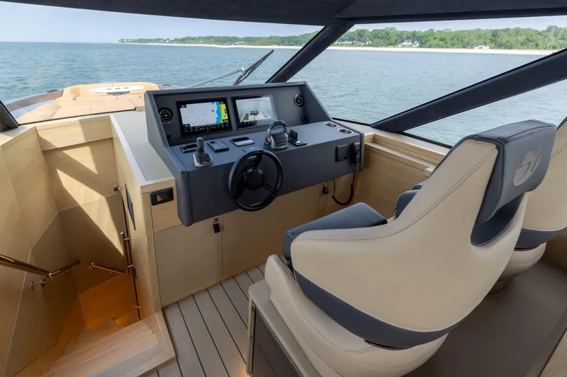 Grit Yacht Photos Pics 2025 Steeler Bronson 67 Beachclub yacht cockpit with modern navigation system and luxurious seating.