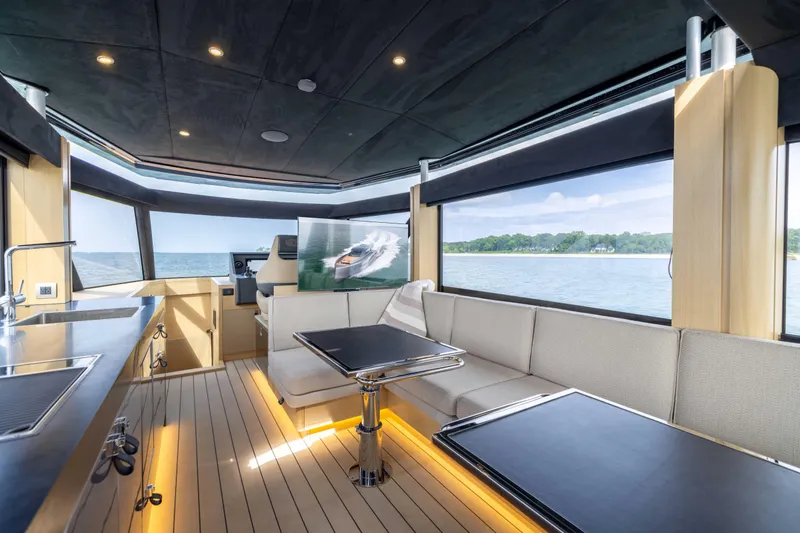 Grit Yacht Photos Pics Luxurious interior of 2025 Steeler Bronson 67 Beachclub yacht with modern design and scenic views.