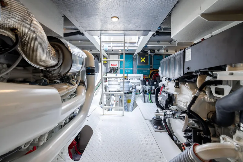 Grit Yacht Photos Pics Engine room of 2025 Steeler Bronson 67 Beachclub yacht, showcasing advanced machinery.