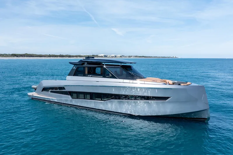 Grit Yacht Photos Pics 2025 Steeler Bronson 67 Beachclub yacht cruising on open blue sea.