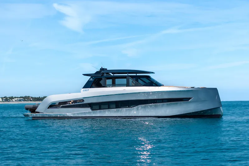 Grit Yacht Photos Pics 2025 Steeler Bronson 67 Beachclub yacht on calm blue ocean waters.