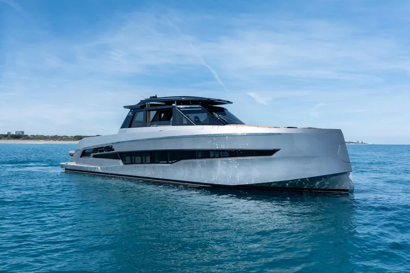 Grit Yacht Photos Pics 2025 Steeler Bronson 67 Beachclub yacht cruising on clear blue ocean waters.