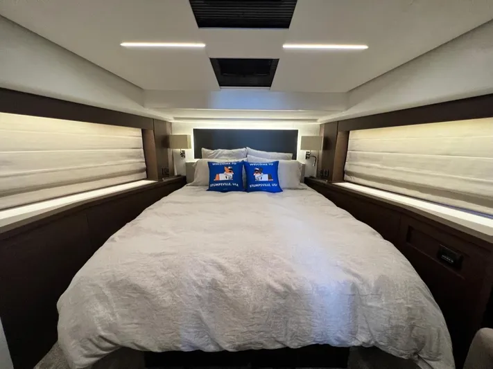  Yacht Photos Pics Luxurious bedroom interior of 2021 Prestige 590 Sport Fly yacht.