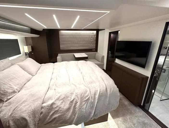  Yacht Photos Pics Luxurious bedroom interior of 2021 Prestige 590 Sport Fly yacht with modern design.