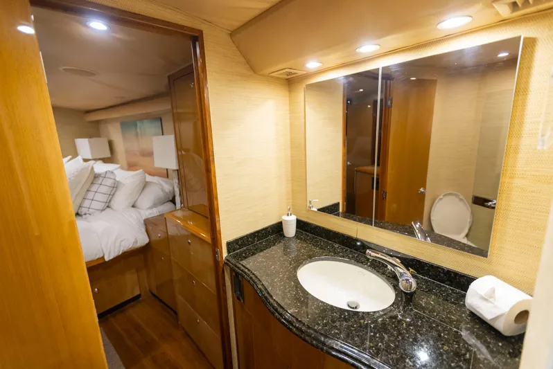Relentless Yacht Photos Pics Luxurious bathroom and bedroom in 2003 Viking 61 Convertible yacht.