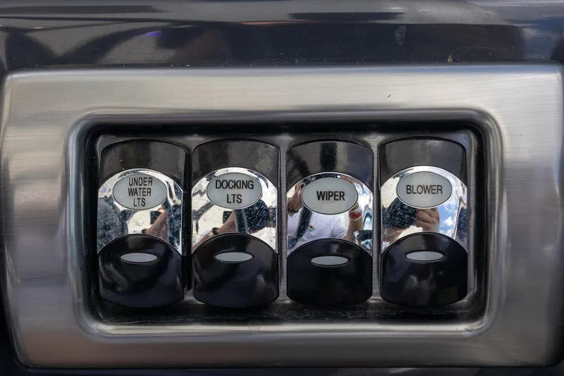 Rum Punch It Yacht Photos Pics Control panel of a 2018 Formula 37 Performance Cruiser with labeled switches.