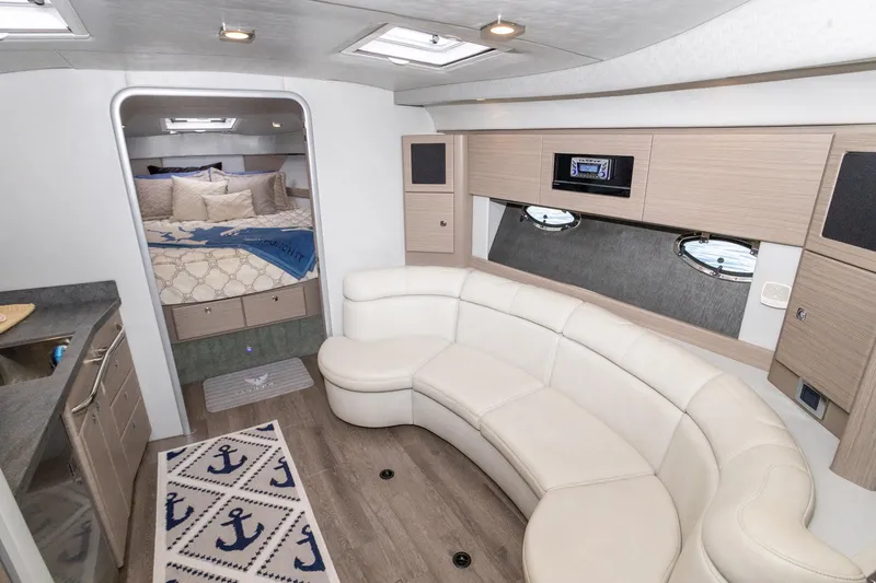Rum Punch It Yacht Photos Pics Interior of 2018 Formula 37 Performance Cruiser with modern seating and cozy bedroom.