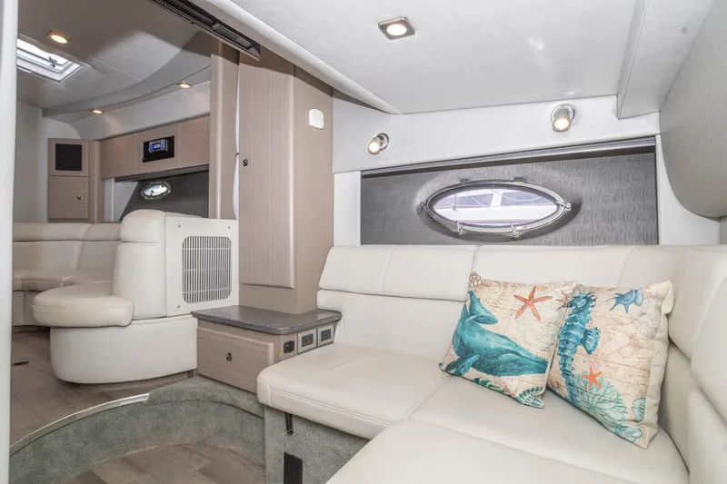 Rum Punch It Yacht Photos Pics Luxurious interior of 2018 Formula 37 Performance Cruiser with elegant seating and nautical-themed decor.