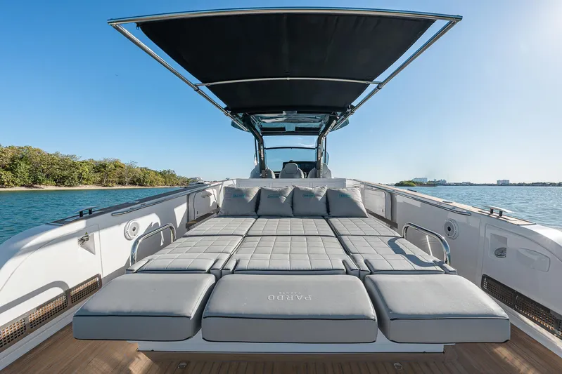 Bote Coco Yacht Photos Pics 2023 Pardo Yachts P38 luxury deck with sunbed and canopy on open water.