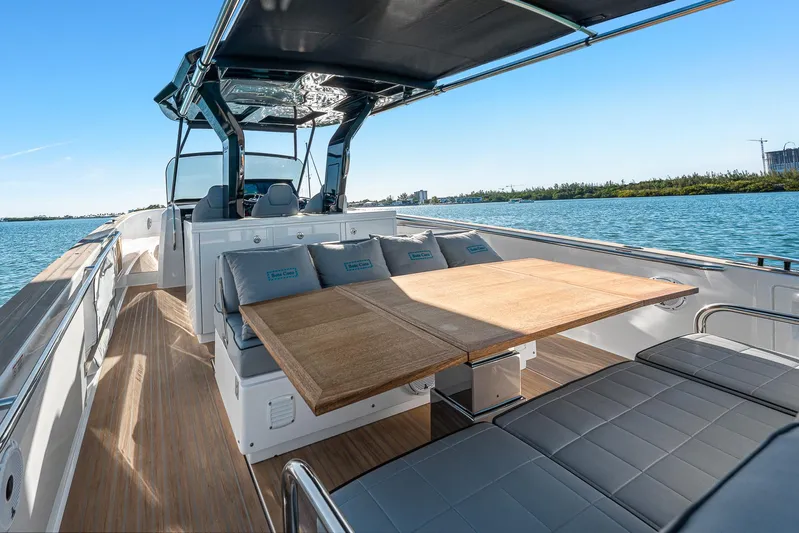 Bote Coco Yacht Photos Pics 2023 Pardo Yachts P38 with sleek deck and seating, cruising on a sunny day.