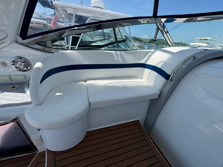  Yacht Photos Pics 2008 Formula 40 PC yacht interior with white seating and blue accents.