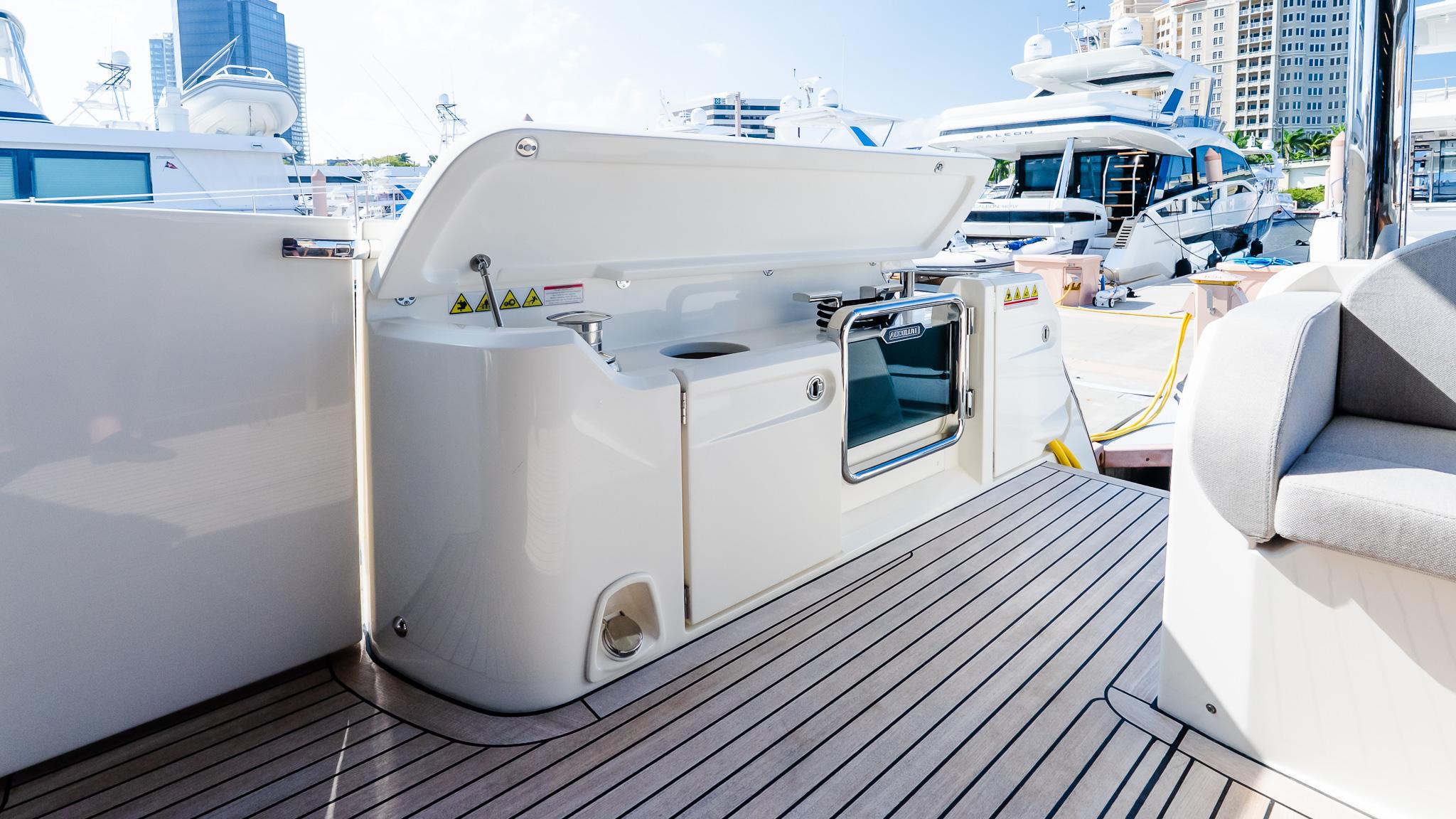 Outdoor kitchen on 2024 Absolute 68 NAVETTA yacht, featuring sleek design and modern amenities.