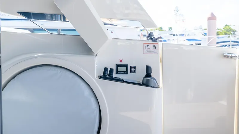 Available Now Yacht Photos Pics Control panel on 2024 Absolute 68 NAVETTA yacht, featuring modern navigation equipment.