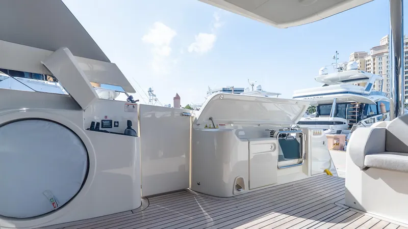 Available Now Yacht Photos Pics Luxurious deck of 2024 Absolute 68 NAVETTA yacht with open storage compartments.