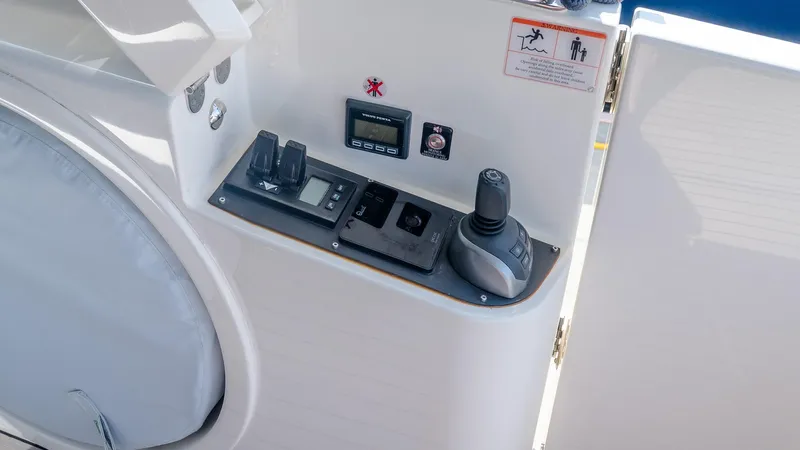 Available Now Yacht Photos Pics Control panel of 2024 Absolute 68 NAVETTA yacht, featuring joystick and digital displays.
