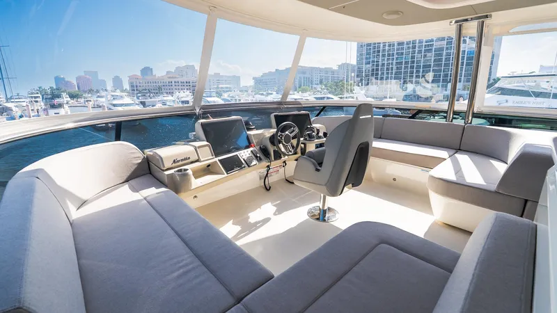 Available Now Yacht Photos Pics Luxurious interior of 2024 Absolute 68 NAVETTA yacht with panoramic views and modern seating.