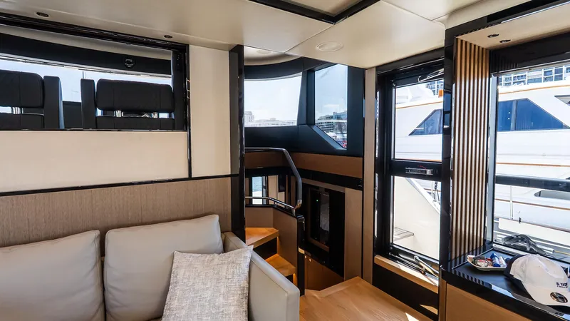 Available Now Yacht Photos Pics Luxurious interior of 2024 Absolute 68 NAVETTA yacht with modern design and comfortable seating.