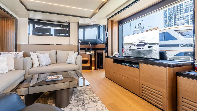 Available Now Yacht Photos Pics Luxurious interior of 2024 Absolute 68 NAVETTA yacht with modern furnishings and large windows.