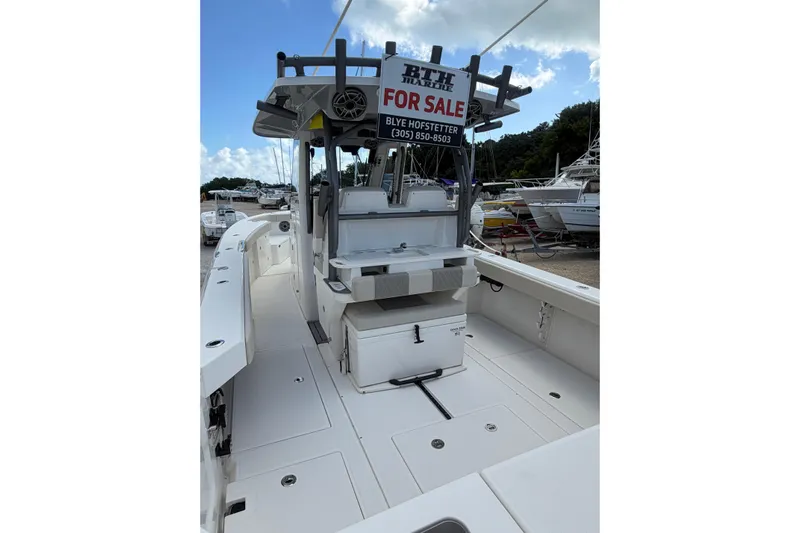  Yacht Photos Pics 2023 Solace 32 CS boat for sale, featuring spacious deck and modern design.