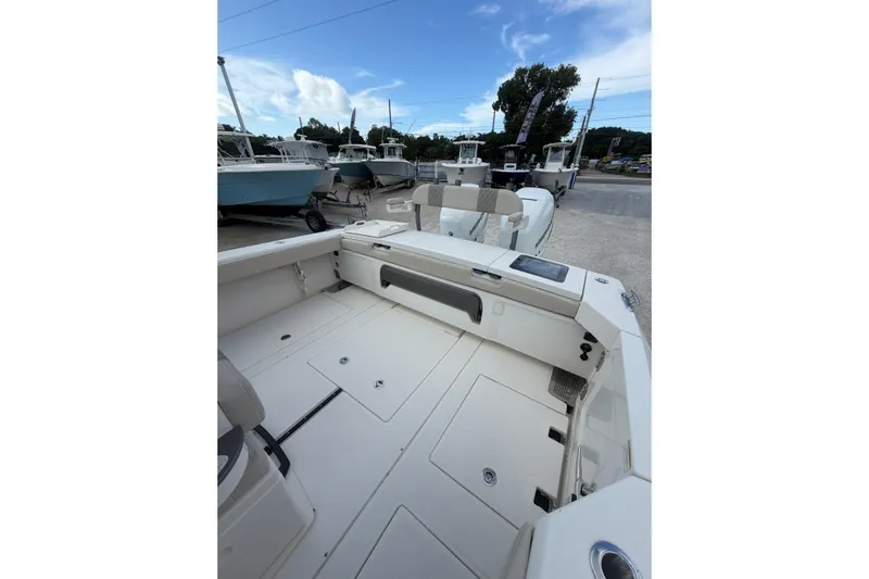  Yacht Photos Pics 2023 Solace 32 CS boat interior with spacious deck and seating area.
