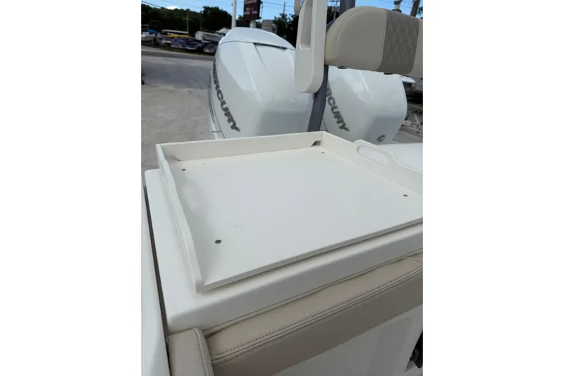  Yacht Photos Pics 2023 Solace 32 CS boat with Mercury engines, featuring a white deck area.