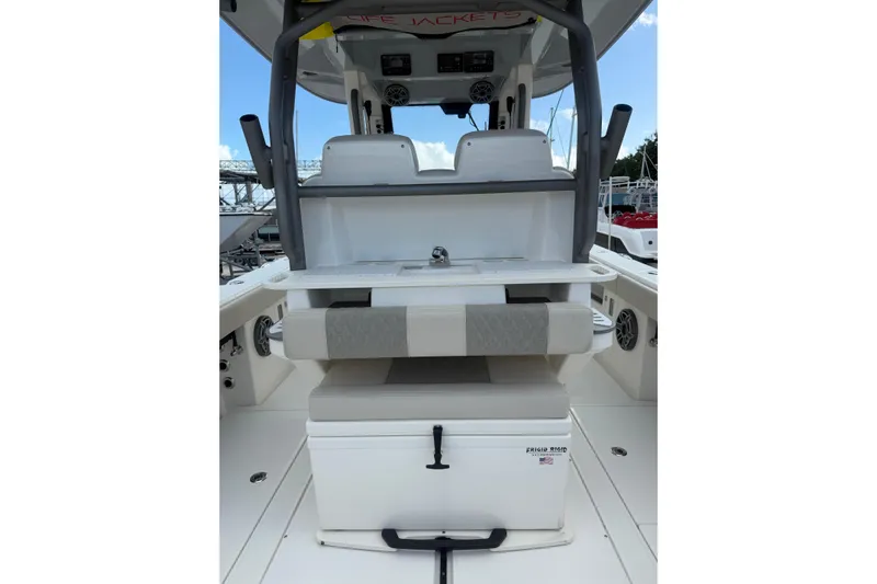  Yacht Photos Pics 2023 Solace 32 CS boat interior with seating, storage, and sink.