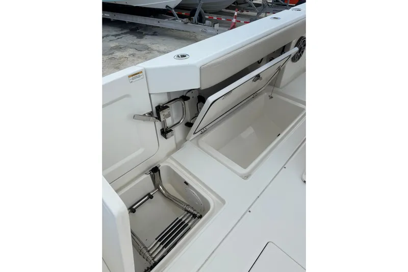  Yacht Photos Pics 2023 Solace 32 CS boat interior with storage compartments and ladder.