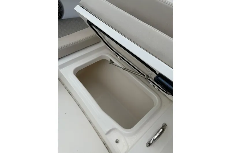  Yacht Photos Pics Open storage compartment in 2023 Solace 32 CS boat interior.